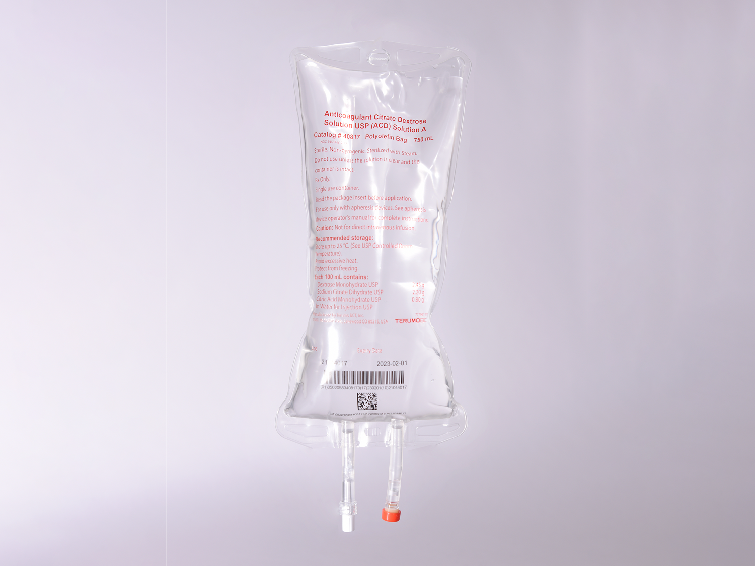 Anticoagulant citrate dextrose solution bag against a gray background