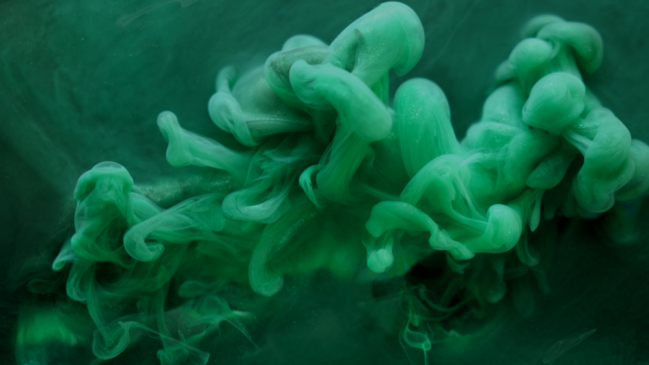 Abstract image of ink in water colored Terumo green